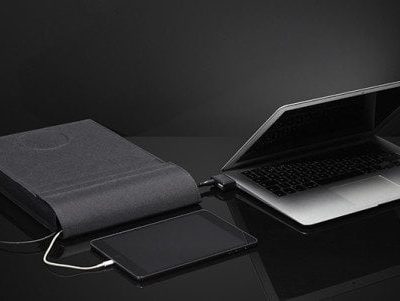 This Laptop sleeve can charge both your laptop and your phone