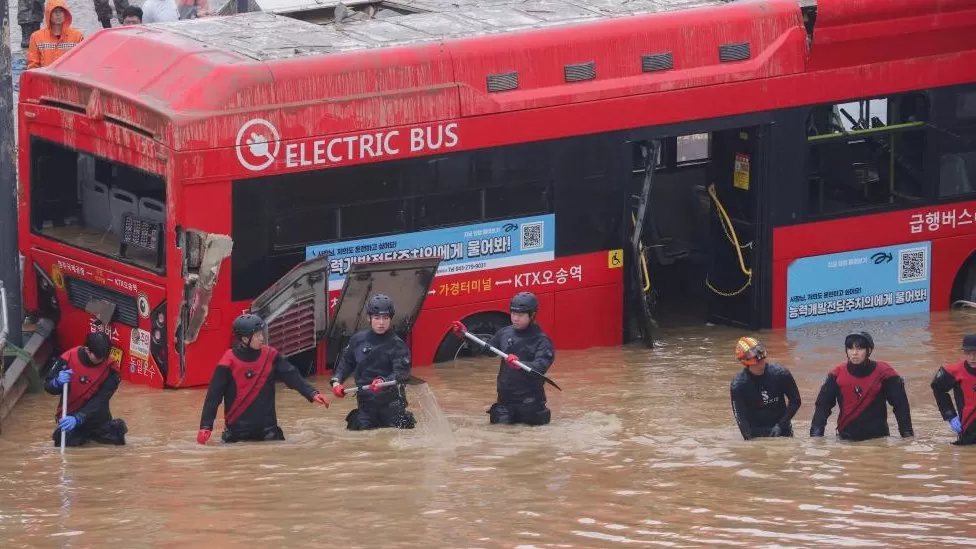 Rescuers Working to Reach Trapped Cars in Flooded South Korea Tunnel